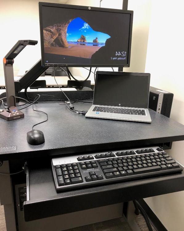 Lectern with desktop computer, laptop and document camera